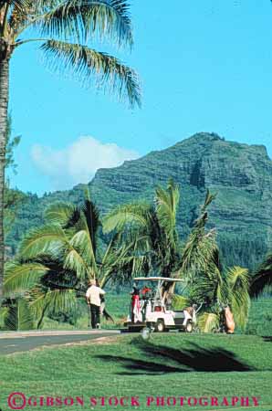 Stock Photo #8695: keywords -  cart course destination golf golfer golfers golfing hawaii hawaiian island islands kauai recreation resort resorts sport sports travel tropical usa vacation vert wailua