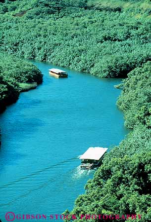 Stock Photo #14972: keywords -  boat boats destination freshwater hawaii hawaiian island islands kauai landscape river rivers scenery scenic tour touring travel trip trips tropic tropical tropics vert wailua water