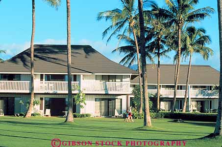 Stock Photo #14979: keywords -  architecture building buildings cottages couple design destination guest hawaii hawaiian horz island islands kauai kiahuna landscape near palm plantation resort resorts scenery scenic style tourist tourists travel traveler travelers tree trees tropic tropical tropics vacation vacationing vacations walking