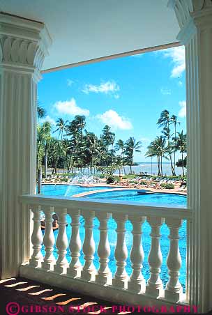 Stock Photo #14980: keywords -  destination hawaii hawaiian hotel hotels island islands kauai landscape lihue marriott people pool pools resort resorts scenery scenic swim swimming tourist tourists travel traveler travelers tropic tropical tropics vacation vacationing vacations vert