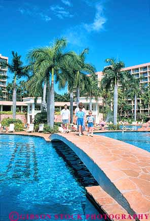 Stock Photo #14984: keywords - child children destination families family hawaii hawaiian hotel hotels island islands kauai landscape lihue marriott people pool pools resort resorts scenery scenic swim swimming tourist tourists travel traveler travelers tropic tropical tropics vacation vacationing vacations vert