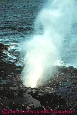 Stock Photo #8713: keywords -  attraction blow coast coastal destination hawaii hawaiian hole horn island islands kauai marine maritime ocean resort resorts sea seashore seawater shore shoreline spout spouting spouts spray sprayi tourist travel tropical upward usa vacation vert water wave