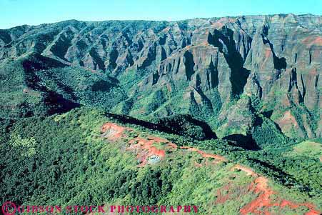 Stock Photo #15002: keywords -  aerial aerials canyon dense destination forest green hawaii hawaiian hill hills horz island islands kauai landscape lush mountain mountains rainforest rough rugged scenery scenic slope slopes steep terrain travel tropic tropical tropics vacation vacationing vacations verdant waimea