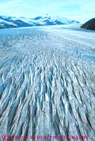 Stock Photo #10375: keywords -  aerial aerials alaska blue climate climatology cold crack cracked crevasse crevasses desolate desolation ecology environment freeze freezing frozen glaciated glaciation glacier glaciers habitat ice icefield icy juneau landscape level nature ocean scenery scenic sea snow vert water wilderness winter