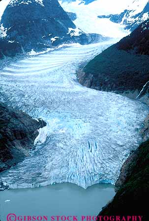 Stock Photo #15003: keywords -  aerial aerials alaska alaskan arctic barren climate cold desolate desolation flow flowing flows freeze freezing frozen glacial glaciated glaciation glacier glaciers ice icefield icefields inlet juneau landscape nature near remote river scenery scenic taku temperate terrain vert wilderness winter