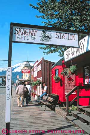 Stock Photo #10396: keywords -  alaska american boardwalk boardwalks broadway building buildings gold historic historical history klondike national park preserve preserved rush shops sidewalk sign signs site sites skagway summer town towns vert