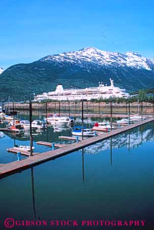 Stock Photo #10398: keywords - alaska and boat boats coast coastal cruise dock docks harbor harbors marina marinas ocean port ports sea seashore ship ships shoreline skagway vert