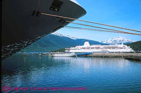 Stock Photo #10399: keywords -  alaska and boat boats coast coastal cruise dock docks harbor harbors horz marina marinas ocean port ports sea seashore ship ships shoreline skagway