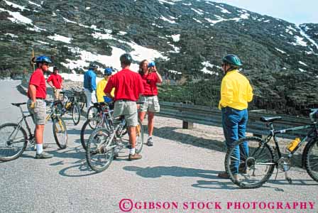 Stock Photo #10405: keywords - alaska american bicycle bicyclers bicycling bicyclists bike biking colorful gold group groups historic historical history horz klondike national park pass rush site sites skagway tour tourist tourists traveler travelers white