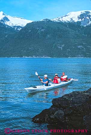 Stock Photo #10410: keywords - adventure adventures alaska boat boaters boating boats canal coast coastal explore exploring group groups haines kayak kayaker kayakers kayaking kayaks lynn marine maritime material ocean paddle paddlers paddling people recreation sea seashore shoreline sport sports synthetic three tour vert water