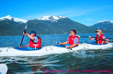 Stock Photo #10412: keywords -  adventure adventures alaska boat boaters boating boats canal coast coastal explore exploring fiberglass float flotation group groups haines horz kayak kayaker kayakers kayaking kayaks lynn marine maritime material ocean paddle paddlers paddling people recreation safety sea seashore shoreline sport sports synthetic three tour vest water