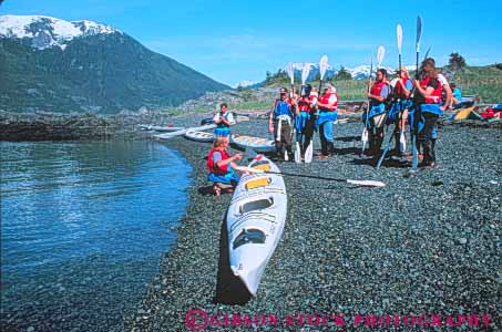 Stock Photo #10413: keywords - adult adults adventure adventures alaska boat boaters boating boats canal class classes coast coastal explore exploring group groups haines horz kayak kayaker kayakers kayaking kayaks learn learning lynn marine maritime ocean paddle paddlers paddling people preparations recreation sea seashore shoreline sport sports teach teacher teaches teaching tour water