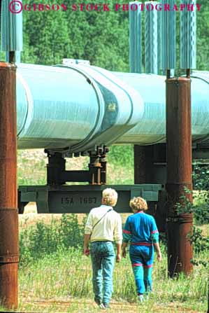 Stock Photo #10433: keywords -  alaska controversial controversy couple ecology environment environmental fairbanks industrial industry looks oil petroleum pipe pipeline pipes technology transalaska transport transporting transports tube vert