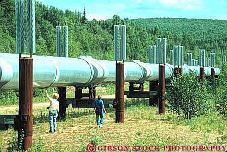 Stock Photo #10434: keywords -  alaska controversial controversy couple ecology environment environmental fairbanks horz industrial industry looks oil petroleum pipe pipeline pipes technology transalaska transport transporting transports tube