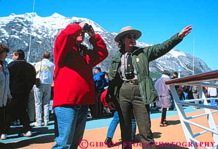 Stock Photo #10456: keywords -  alaska assisted bay binoculars bird birds career climate climatology cold cruise direct directing direction directs employee female freeze freezing frozen glaciated glaciation glacier glaciers guest guests horz ice icy in job jobs level national ocean of park parks passenger point pointing public ranger rhapsody sea seas ship ships spot spotting tour touring tourist tourists tours travel traveler travelers trip vacation vocation watch watcher watching weather woman women work worker working works