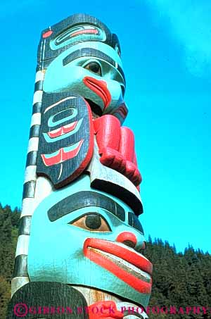 Stock Photo #10473: keywords - alaska american art artistic carve carved craft crafts display face head heritage indian north paint painted pole poles symbol totem tradition traditional vert wood wooden