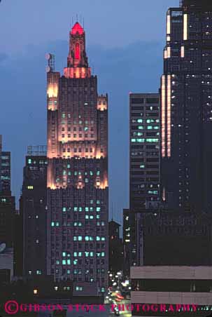 Stock Photo #7748: keywords -  america american architecture building buildings business center cities city cityscape cityscapes dark downtown dusk evening high kansas lights missouri night office rise skyline skylines urban usa vert