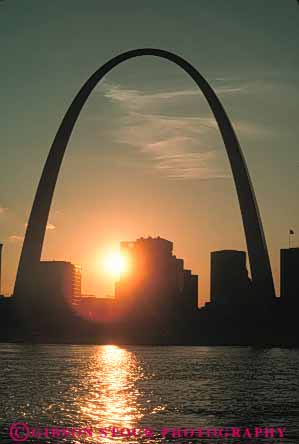 Stock Photo #7756: keywords -  america american arch arches architecture building buildings center cities city curve dark dusk evening gateway graceful louis memorial metal missouri modern saint silhouette silhouettes st st. steel sunset tall urban usa vert