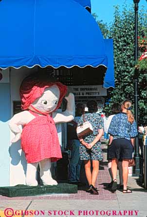 Stock Photo #9536: keywords -  branson destination in missouri old pedestrians people resort resorts shop shopper shoppers shopping sidewalk store stores town towns travel vert