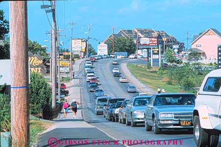 Stock Photo #9539: keywords -  auto automobiles autos backed branson bumper car cars congested crowd crowded dense destination horz hour jam jammed missouri resort resorts rush slow stop stopped street streets traffic travel up vehicle vehicles