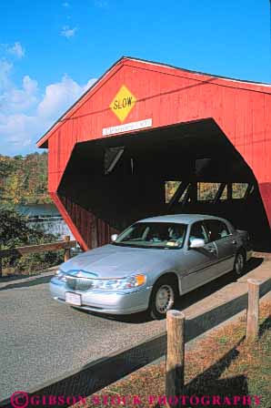 Stock Photo #9311: keywords -  americana antique auto autos bernard bridge bridges brook building car cars cover covered england historic landmark landmarks motion move moving new old over red roof shed span spans structure taftville vermont vert vintage wood wooden