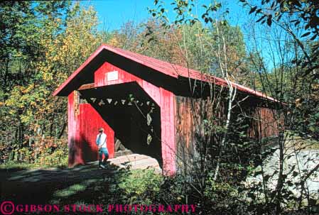 Stock Photo #9316: keywords -  americana antique bridge bridges building center cover covered england historic horz landmark landmarks montgomery new old person roof shed span spans structure vermont vintage walks woman wood wooden