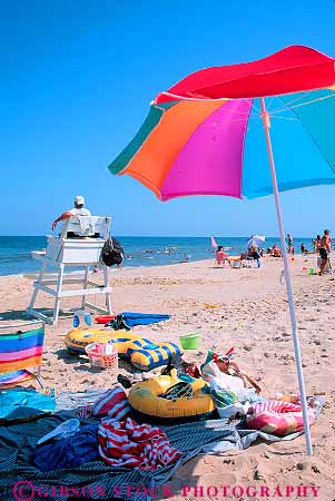 Stock Photo #12361: keywords - beach beaches color colorful delaware hot rehoboth resort resorts sand summer sun sunny sunshine travel umbrella umbrellas vacation vacations vert warm