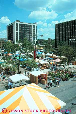 Stock Photo #7767: keywords -  america american annual bix building buildings center cities city cityscape cityscapes davenport downtown event fair iowa market sale sell selling street summer urban usa vert