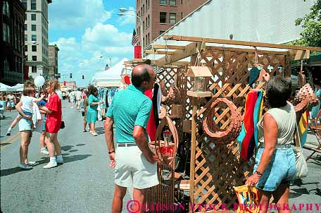Stock Photo #12213: keywords -  activity annual bix business buy buyer buyers buying couple couples customer customers davenport downtown event fair fairs festival festivals horz iowa man pair people season shop shopper shoppers shopping shops small street summer sunny urban vendor vendors warm woman