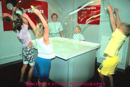 children make giant bubbles Science Station Cedar Rapids Iowa Stock Photo 15300