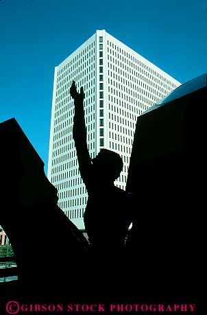 Stock Photo #11850: keywords - abstract art business cities city district downtown metal minneapolis minnesota plaza plazas public reach reaching sculpture sculptures silhouette silhouettes sky skyward up upward upwards urban vert