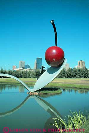 Stock Photo #11858: keywords -  art bizarre cherry cities city different garden gardens minneapolis minnesota pond ponds public sculpture spoon strange unusual vert