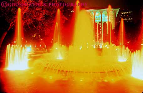 Stock Photo #11861: keywords - bright center color colorful dark downtown evening exposure fountain fountains gateway horz long minneapolis minnesota night orange splash splashing time urban water yellow