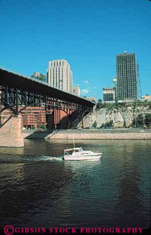 Stock Photo #7778: keywords -  america american architecture boat boating building buildings business center cities city cityscape cityscapes downtown high minnesota mississippi modern motorboat new office paul rise river saint skyline skylines st st. urban usa vert