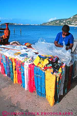Stock Photo #10159: keywords - antilles caribbean clothes clothing colorful craft crafts destination destinations fabric island islands leeward lesser maarten marrten marten native ocean philipsburg saint sea sell seller sells souvenir souvenirs st st. sunny sunshine travel tropic tropical vacation vendor vendors vert virgin warm woman