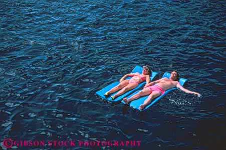 Stock Photo #10170: keywords -  affection affectionate alone anguilla antilles caribbean couple destination destinations floating floats flotation foam hands hold horz island islands leeward leisure lesser loving mats matts ocean quiet relax relaxed relaxing released sea serene serenity share sleep sleeping solitary solitude sunny sunshine together travel tropic tropical vacation virgin warm