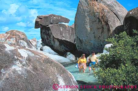 Stock Photo #10184: keywords - antilles baths caribbean couple destination destinations gorda horz island islands leeward lesser man ocean pair resort resorts rock rocks sea sunny sunshine surf travel tropic tropical tropics vacation virgin wading warm water woman