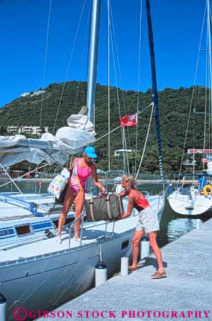 Stock Photo #10199: keywords -  antilles boat boaters boating caribbean destination destinations island islands leeward lesser load luggage marina marinas ocean recreation resort resorts sailboat sailors sea sunny sunshine tortola tourist tourists travel traveler travelers tropic tropical tropics vacation vert virgin warm woman women