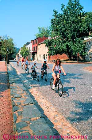 Stock Photo #12473: keywords -  action activity american bicycle bicycles bicycling bike bikes building buildings children district exercise exercising families family ferry fun group groups harpers historic history national old parents park peddle play playing public recreation ride riding road roads roll rolling streets together tour touring town towns trip vacation vert vintage virginia west
