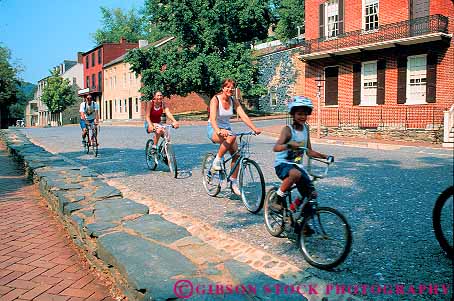 Stock Photo #12474: keywords -  action activity american bicycle bicycles bicycling bike bikes building buildings children district exercise exercising families family ferry fun group groups harpers historic history horz national old parents park peddle play playing public recreation ride riding road roads roll rolling streets together tour touring town towns trip vacation vintage virginia west