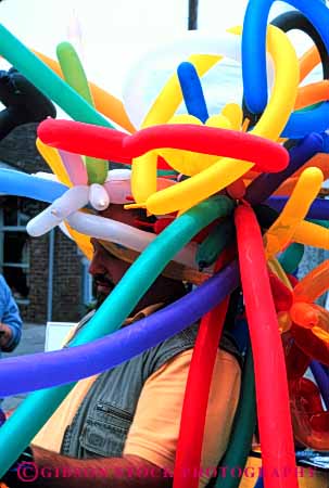 Stock Photo #6034: keywords -  air balloon balloons bizarre color colorful create different float hat head inflate inflated lighter long make produce round shape strange than tube vert weird