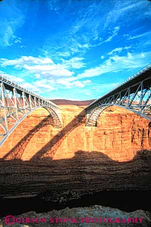 Stock Photo #11009: keywords - across and angle angles arizona brace braced bracing bridges canyon colorado connect connected connecting connects cross crossbrace crossbraced crosses engineer engineered engineering geometric geometrical geometry identical image iron marble metal mirror navajo new old over pair reach reaches reaching rigid rigidity river same sameness sandstone similar span spanning spans steel structure support supports transportation triangle triangles two vert water