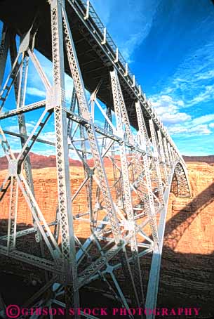 Stock Photo #11010: keywords -  across angle angles arizona brace braced bracing bridge bridges canyon colorado connect connected connecting connects cross crossbrace crossbraced crosses engineer engineered engineering geometric geometrical geometry iron marble metal navajo old over reach reaches reaching rigid rigidity river sandstone span spanning spans steel structure support supports transportation triangle triangles vert water