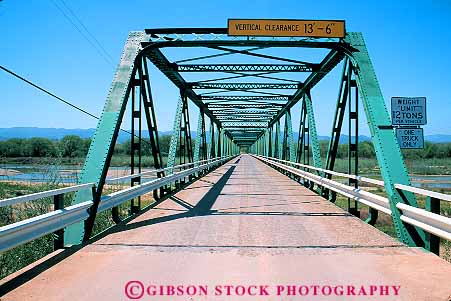 Stock Photo #18284: keywords -  angle angles angular brace braced bracing bridge bridges california criss cross crossed crosses diagonal diagonally diagonals engineered engineering geometric geometrical geometry highway horz lucas metal over river road salinas san shape shaped shapes steel structually structural structure support supports triangle triangles triangular