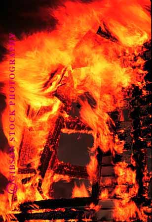 Stock Photo #1237: keywords - building buildings burn burned burning claim damage destroy disaster fire flame flames heat hot insurance liability loss orange property vert wood