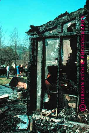 Stock Photo #1240: keywords - ash buildings burn burned burnt california charred claim damage destroy destroyed disaster examine fire flame heat home hot house insurance lafayette liability loss people property sad vert wood