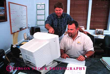 Stock Photo #1249: keywords -  assists business commerce computer consultant corporate data education horz income job man men occupation office paycheck people person professional released success teach team technology training two work worker workers working