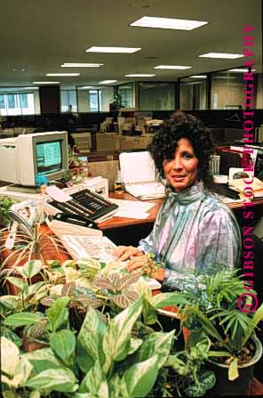 Stock Photo #1250: keywords -  business commerce computer corporate ethnic female income job minority occupation office paycheck pretty professional receptionist released secretary vert woman work worker workers working works