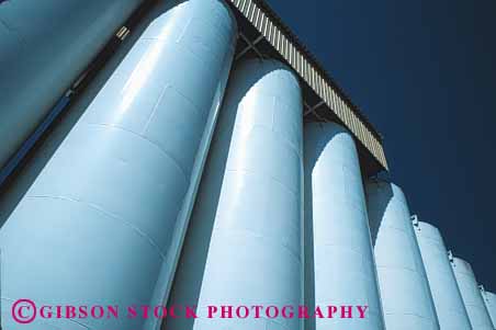 Stock Photo #1267: keywords -  agriculture building california cylinder cylindrical elevator farm food grain grow high horz modern of round rounded row rows sacramento scenic shape shaped shipping silo storage summer tall tube tubes white