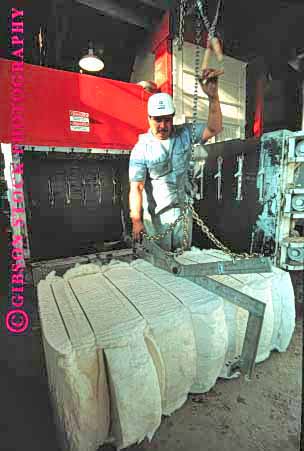 Stock Photo #1279: keywords -  agriculture bale bales bulk california corcoran cotton crane cranes farm farming heavy lift lifting lifts man moving pa people person power process processing shipping vert weight with work worker workers working works